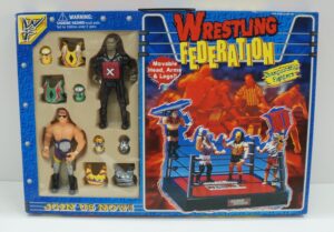 WF Wrestling Federation. Ring + 2 Action Figure con Accessori Championship Fighters (Nero X e Multicolor) Licenza non ufficiale WWE