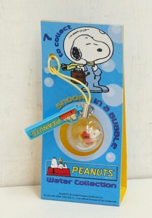 Snoopy in a Bubble. Peanuts Water Collection. Ciondolo per Cellulare Phone. Laccio Giallino